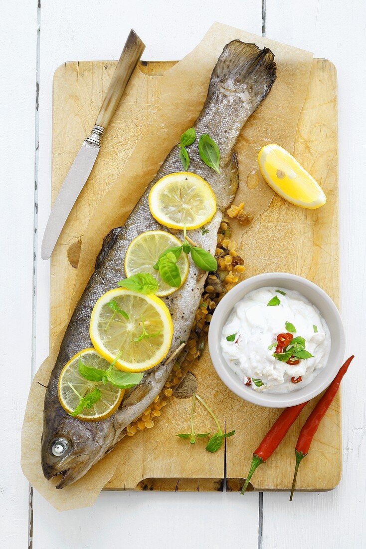 Trout stuffed with lentils, with chilli yoghurt