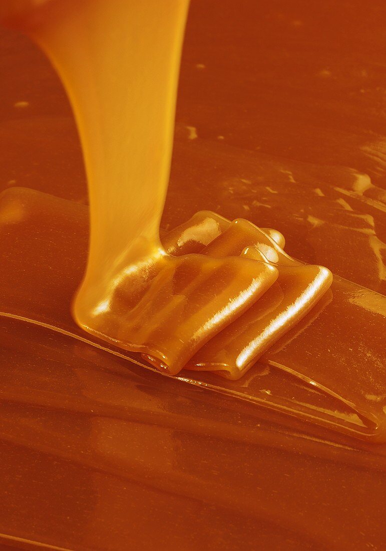 Pouring caramel sauce