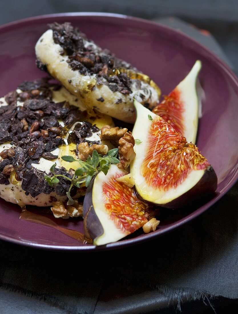 Cheese with dried vine leaves, honey, walnuts, figs
