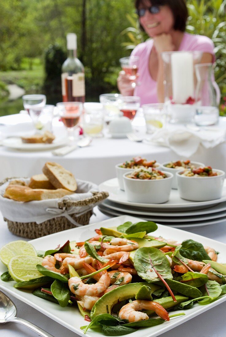 Salad leaves with avocado and prawns