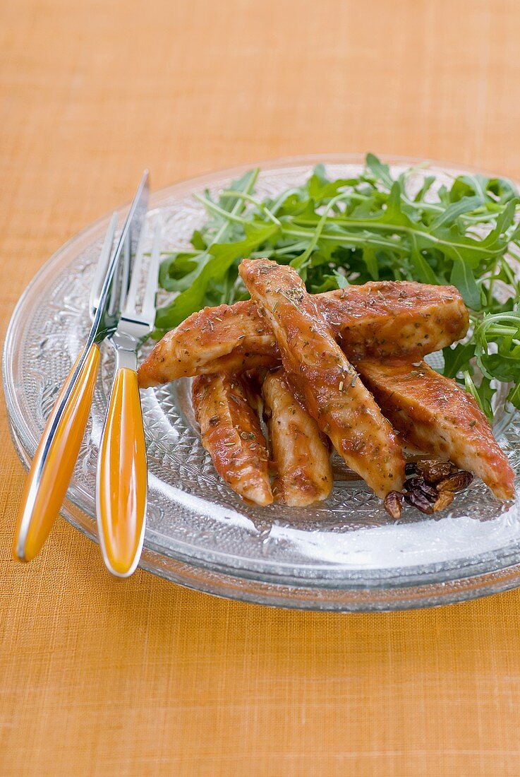 Hähnchenbrusttreifen in Kräutermarinade mit Rucola