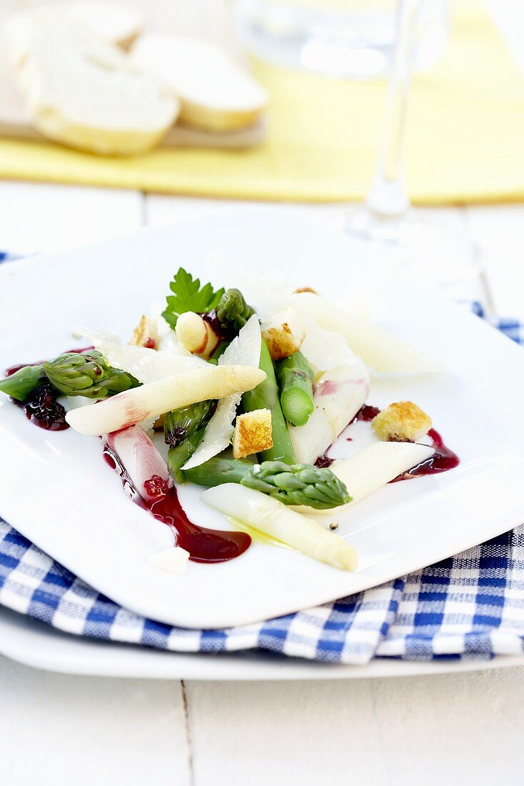 Asparagus salad with blackberry dressing and croutons