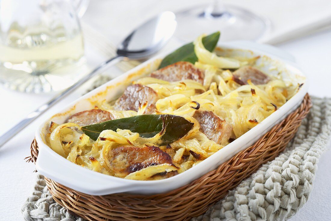 Oven-baked pork fillet with cheese and onions