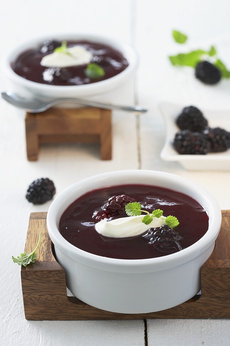 Blackberry soup with cream and mint
