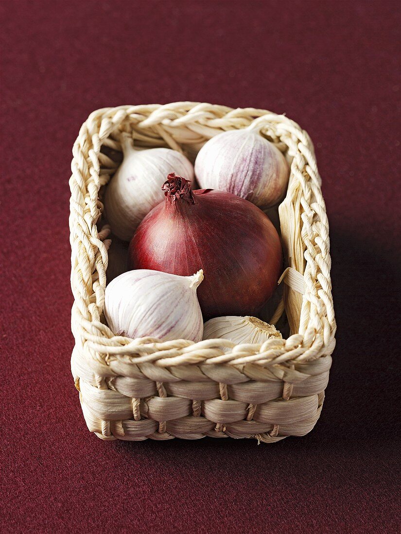Onion and garlic in a small basket