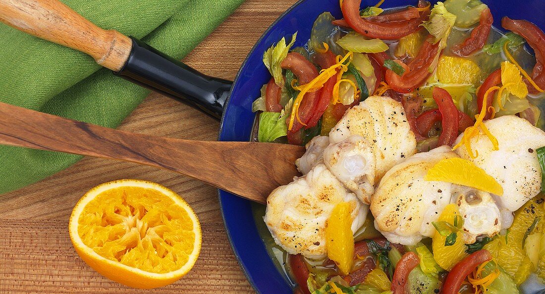 Monkfish with oranges and tomatoes