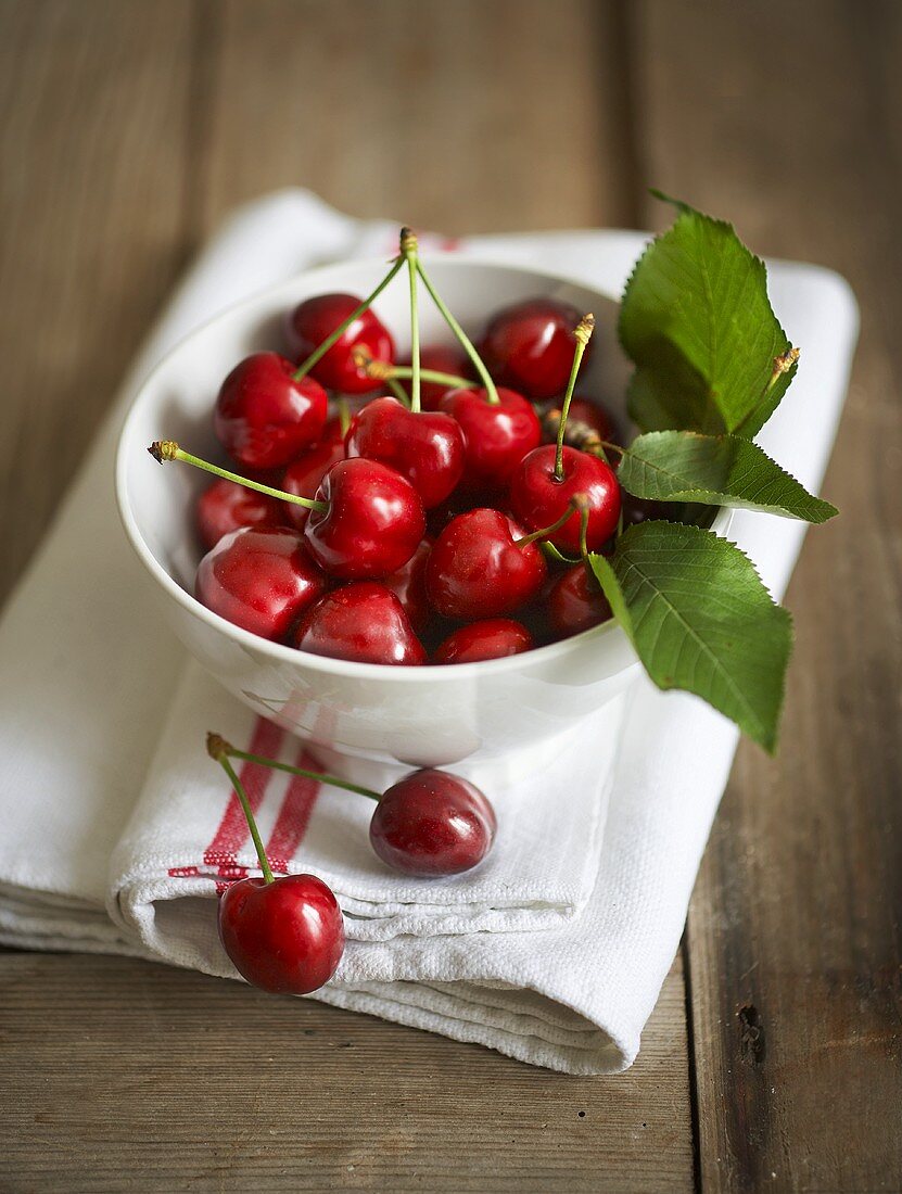 Cherries in a white bowl