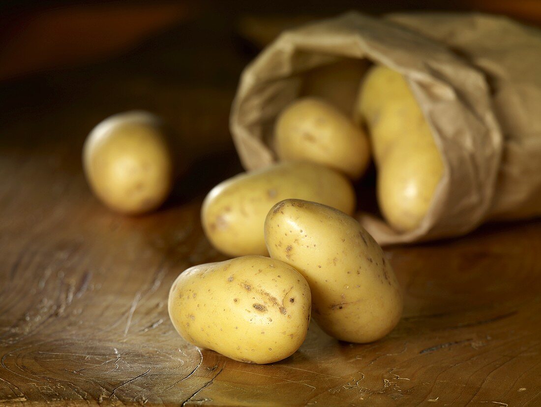 Potatoes (variety: Amandine) with paper bag