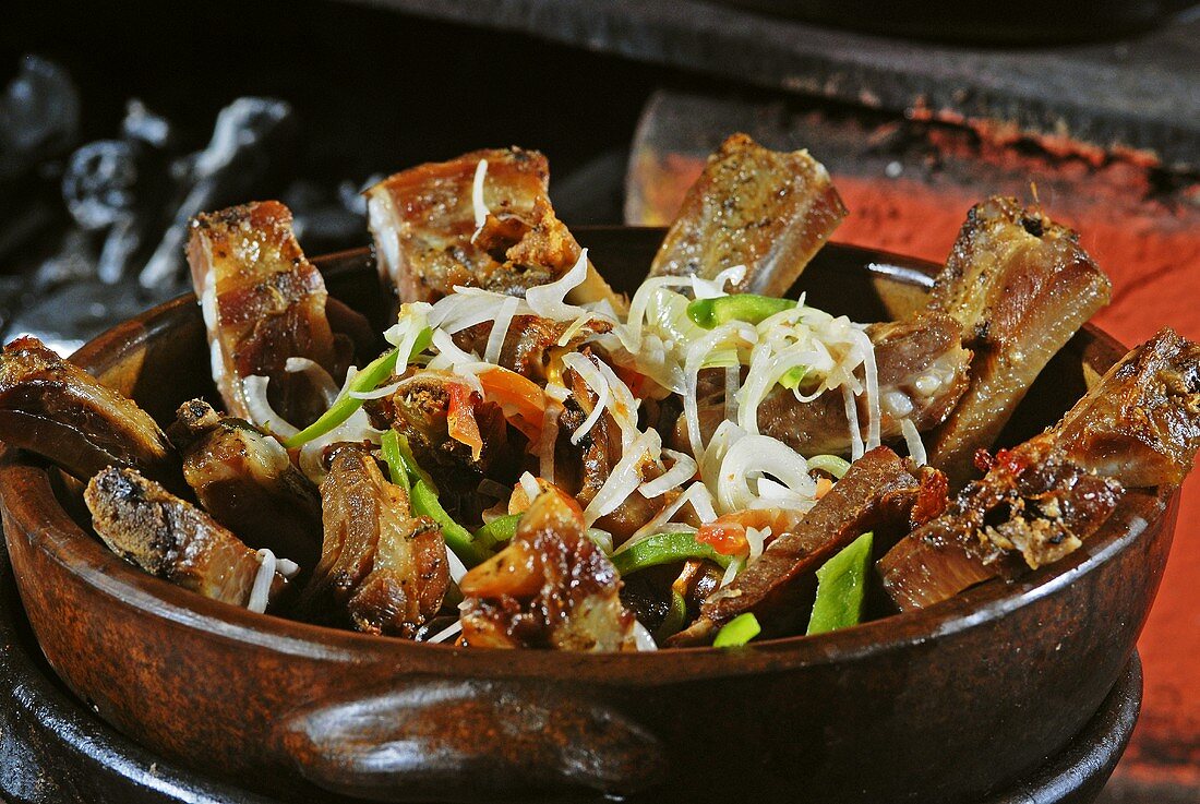 Costela de Porco (grilled pork ribs in a terracotta pot, Brazil)