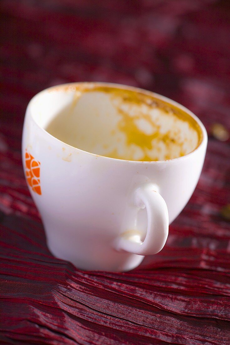 Empty espresso cup with coffee dregs