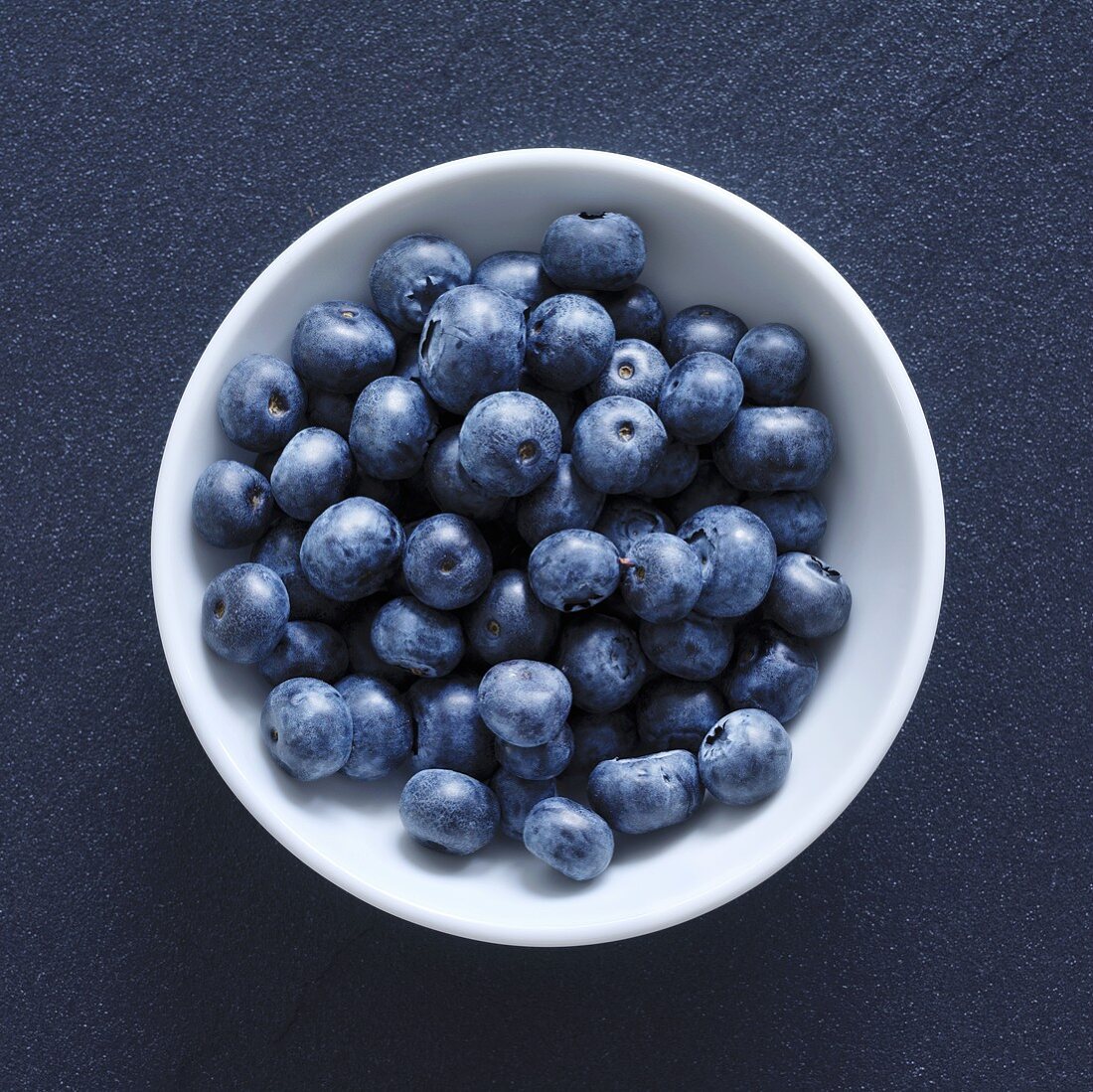Blueberries in small white bowl