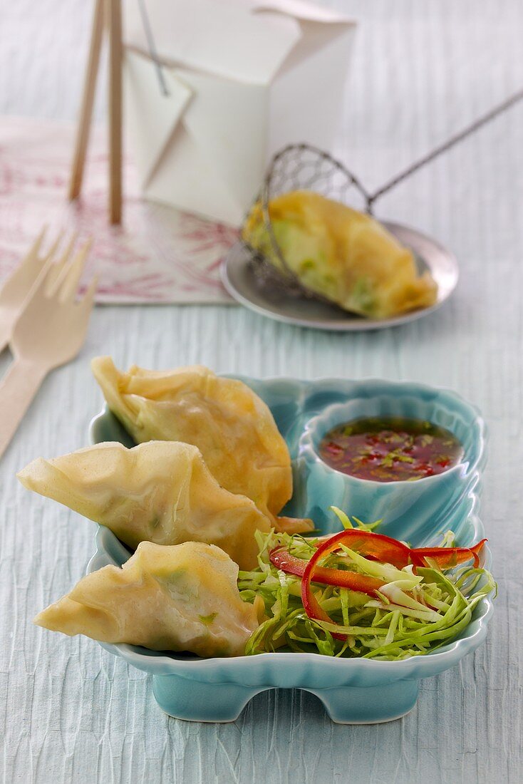Jiaozi with prawn filling, cabbage salad and chilli dip