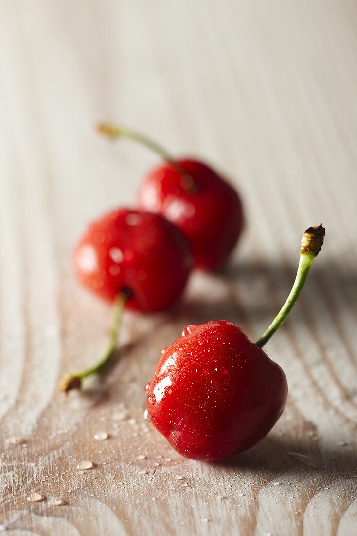 Three freshly washed cherries