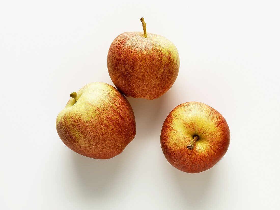 Three apples (variety: Gala)