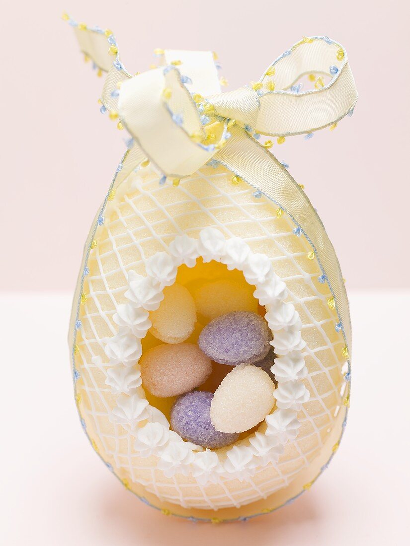 Filled sugar egg with bow for Easter