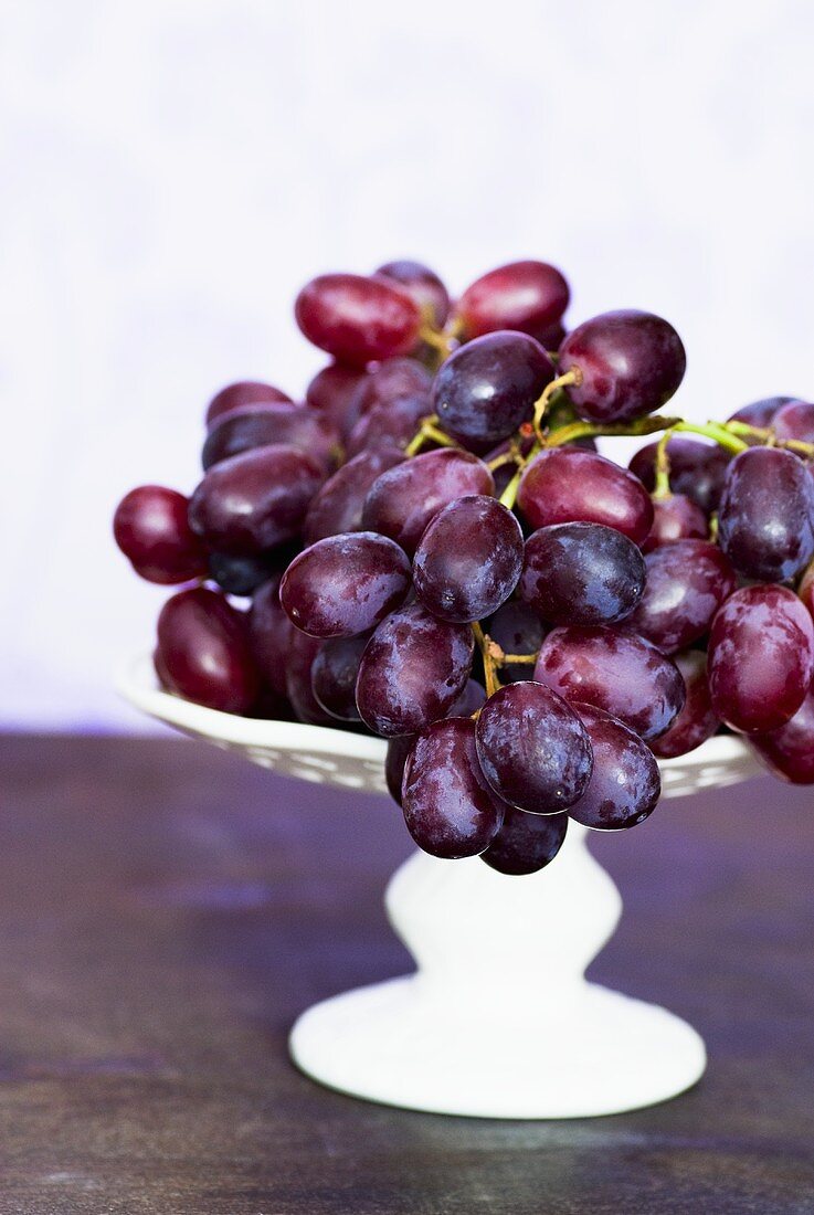 Red grapes in pedestal bowl