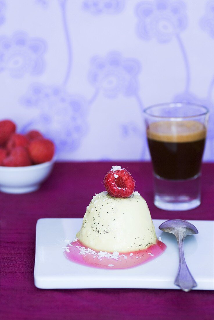 Panna cotta with grated coconut, raspberry and espresso
