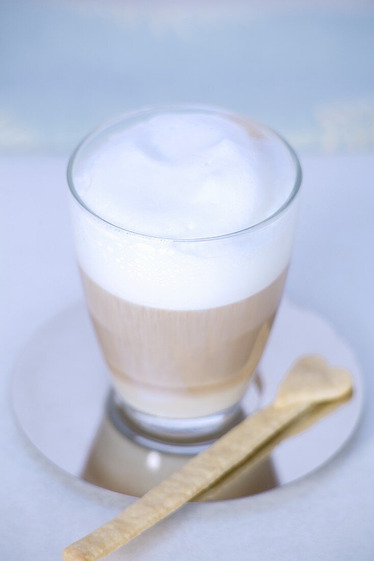 Milky coffee in a glass