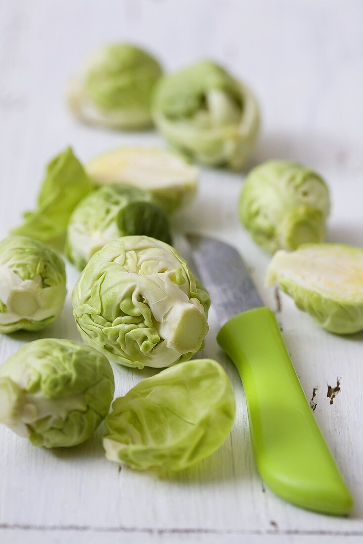 Brussels sprouts with kitchen knife