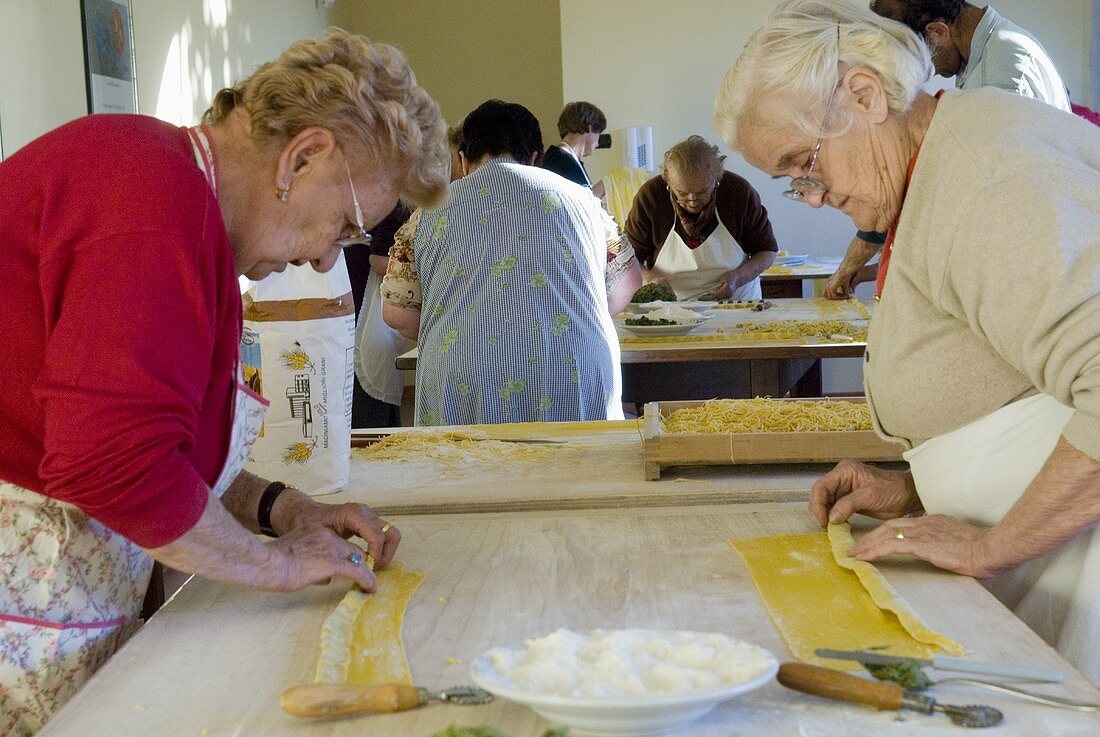 Making agnolotti (small filled pasta parcels, Italy)