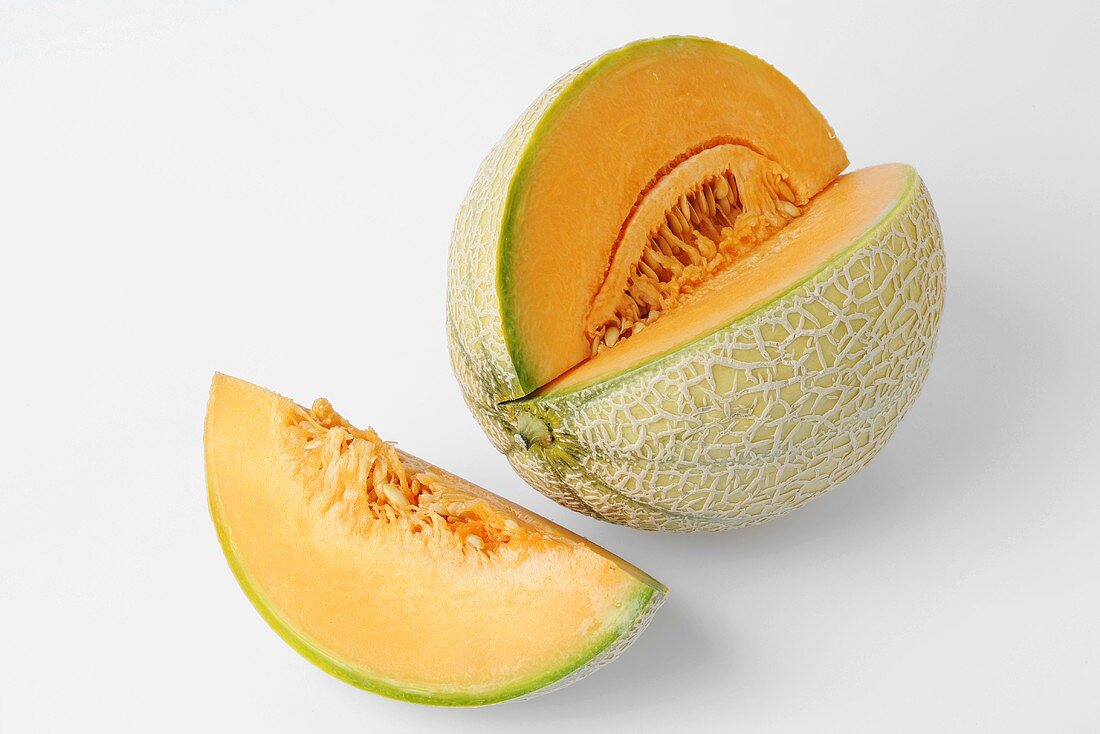 Netted melon with a section removed