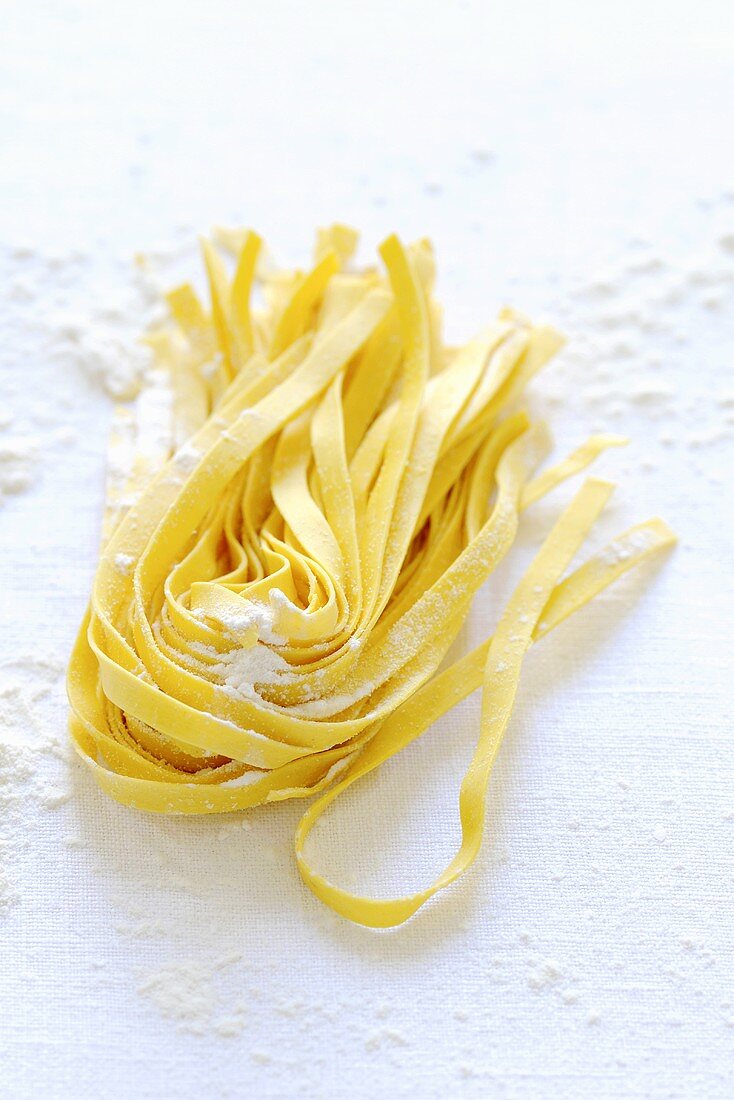 Home-made ribbon pasta with flour