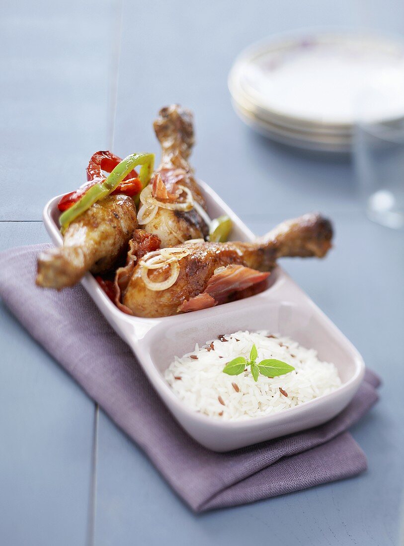 Chicken legs with peppers and rice