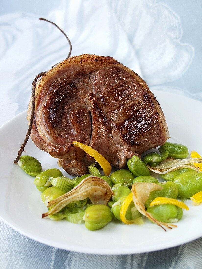 Loin of lamb with broad beans and lemon zest