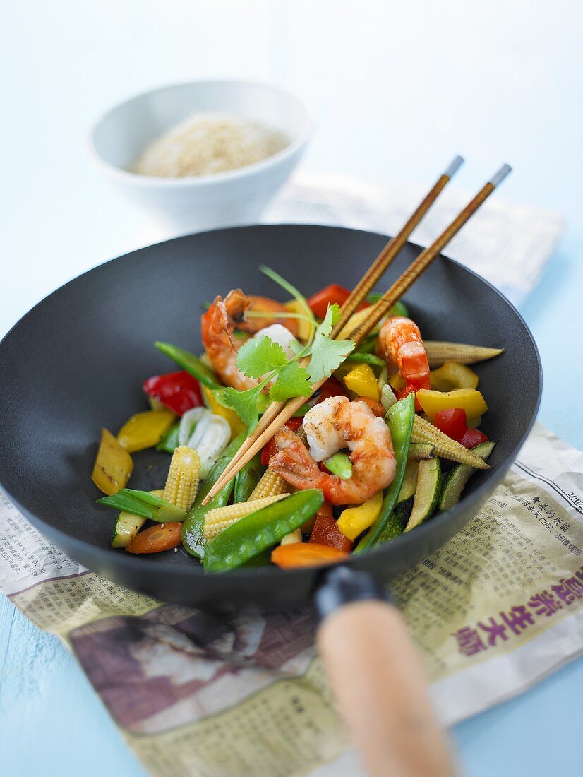 Prawns and vegetables in wok