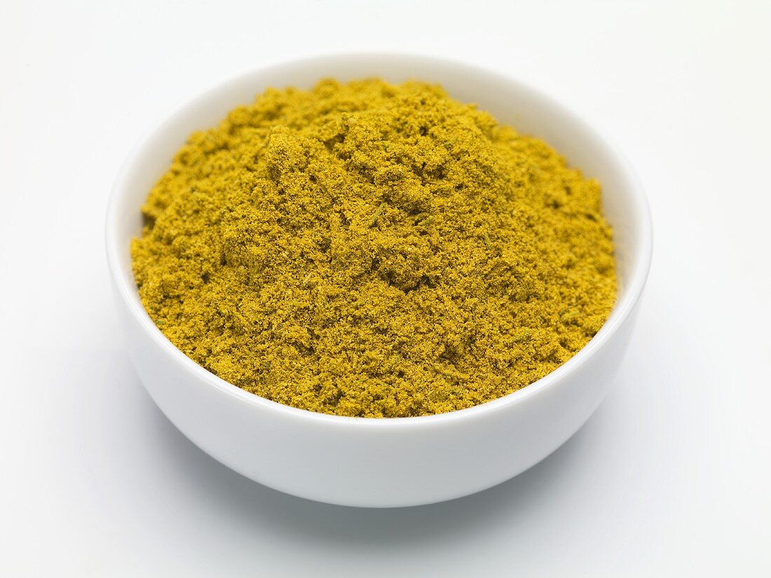 Seasoning mixture (Colombo Powder) in a small bowl