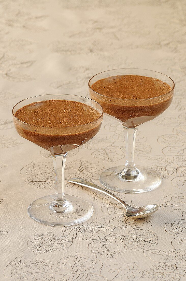 Chocolate caramel mousse in two glasses