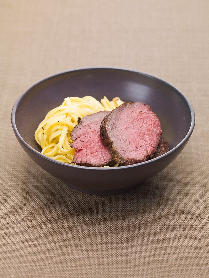 Beef fillet with fresh ribbon pasta