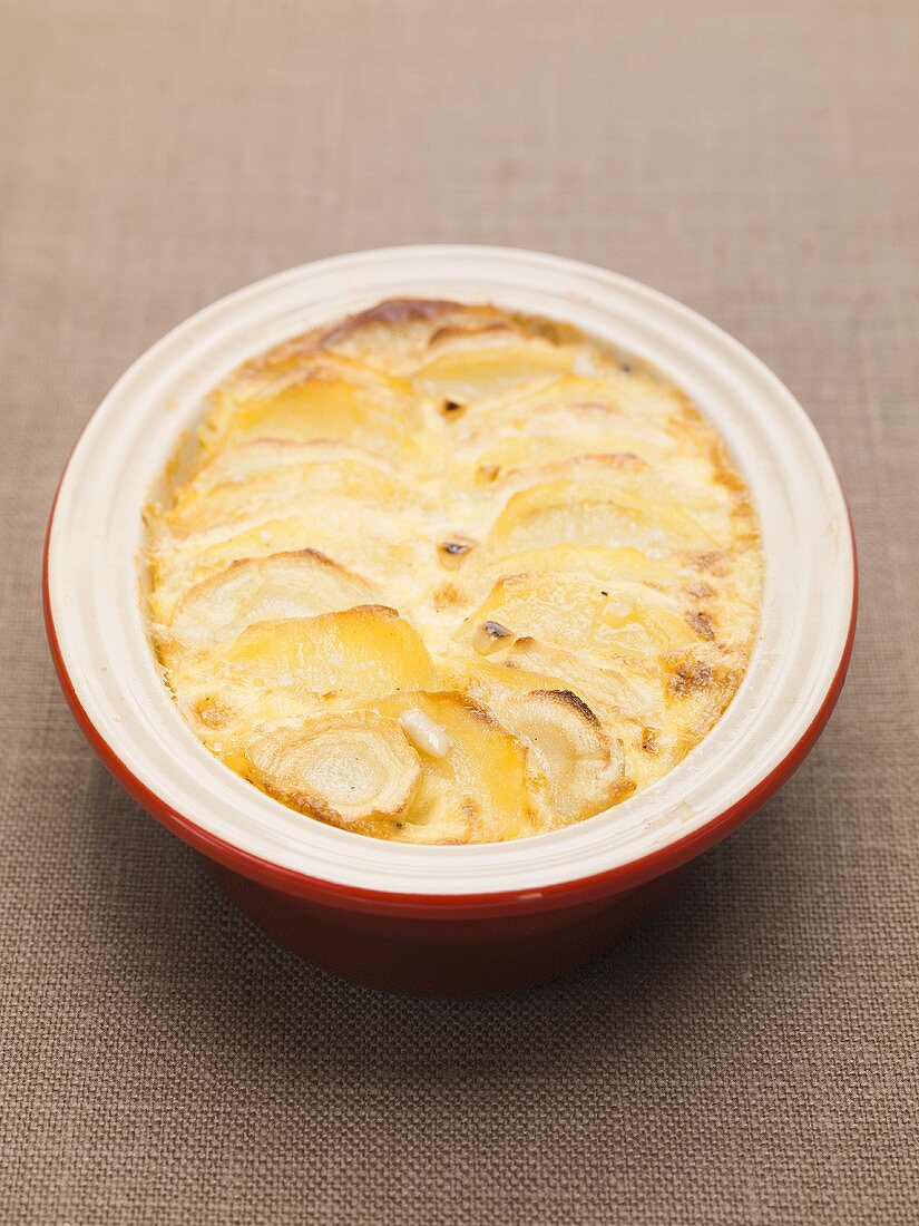 Root vegetable gratin in a dish