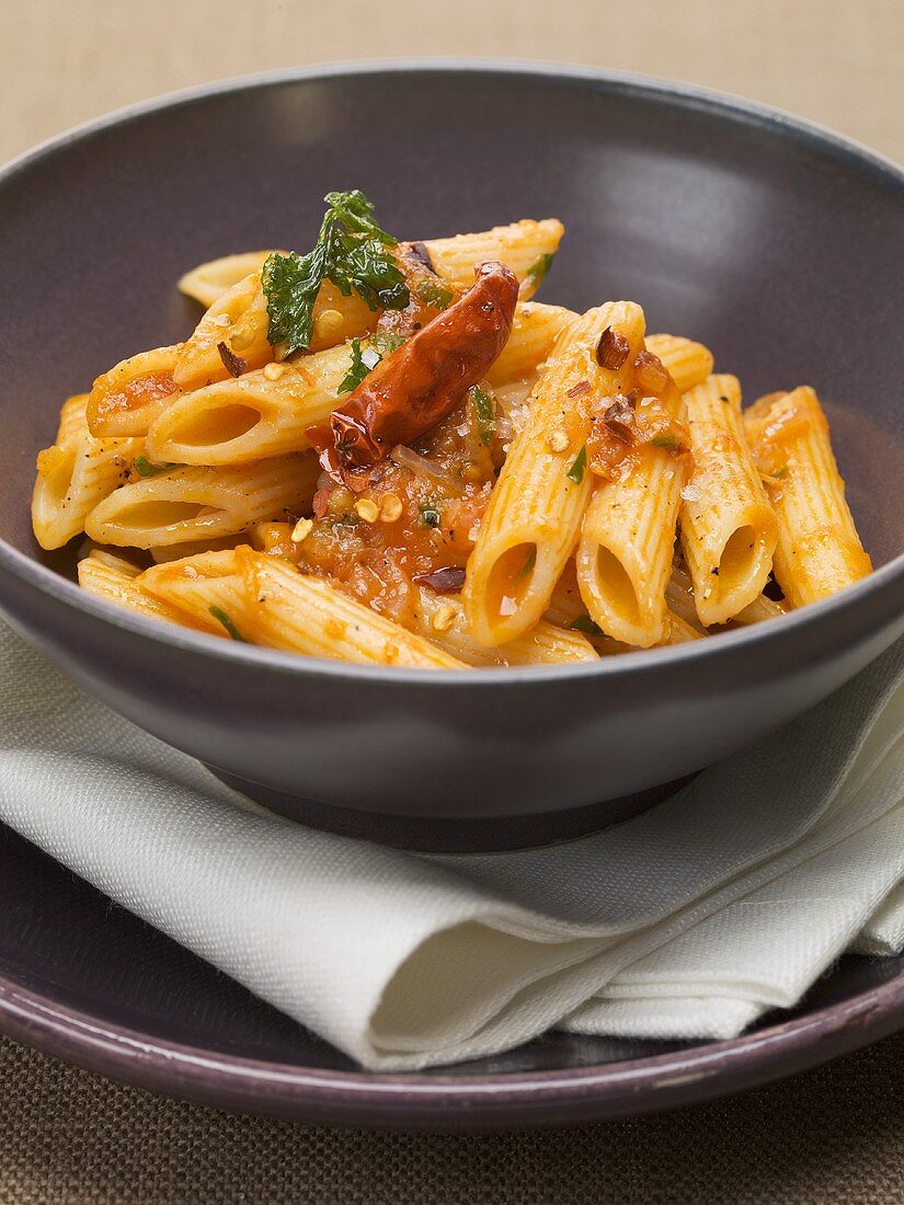 Penne rigate all'arrabbiata (Pasta with spicy sauce, Italy)