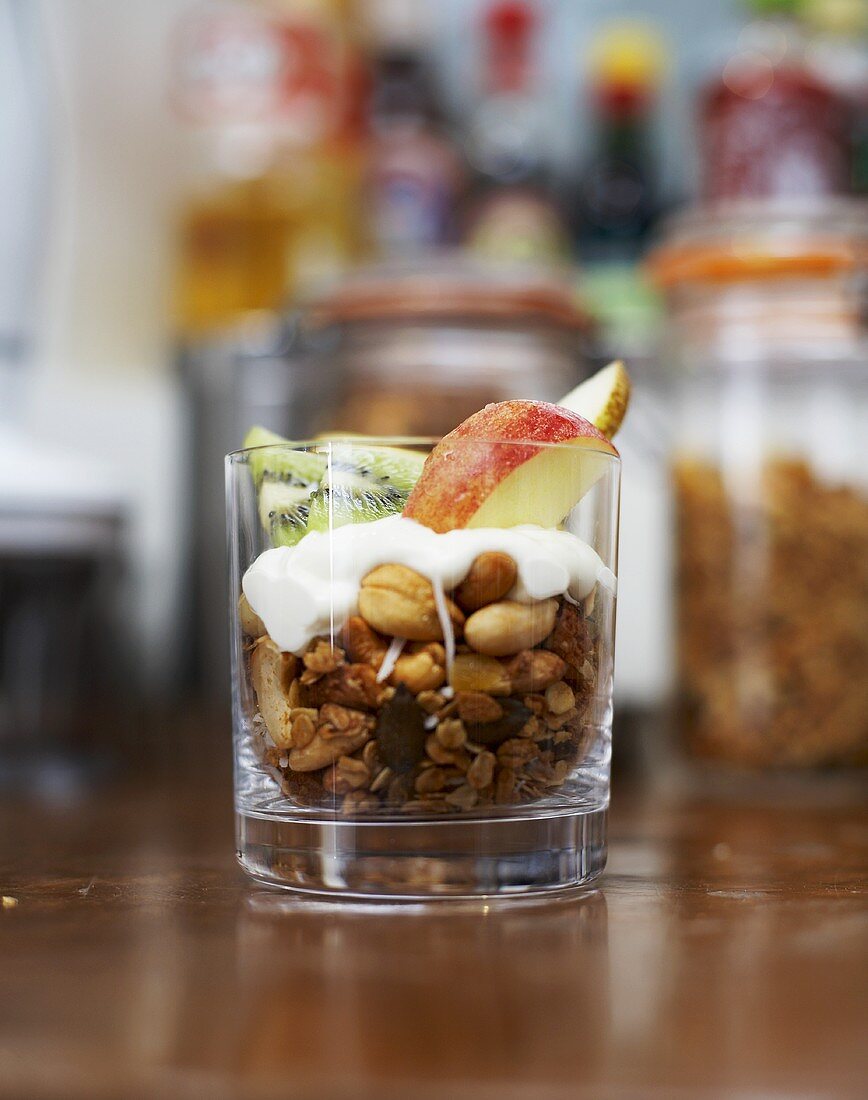 Muesli with yoghurt and fruit in glass