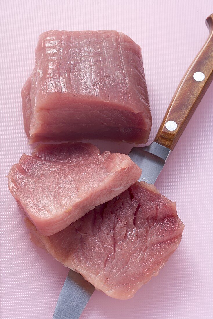 Pork fillet with meat knife