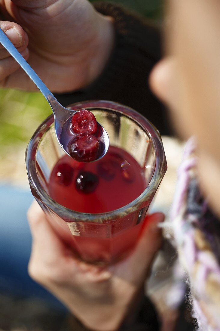 A glass of apple and cranberry punch