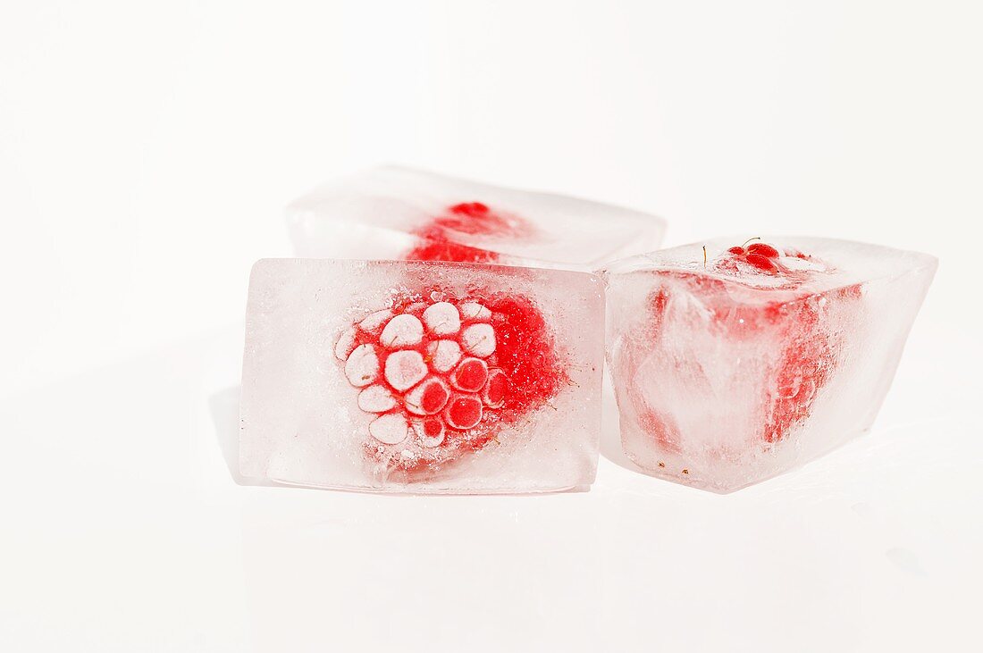 Three raspberry ice cubes