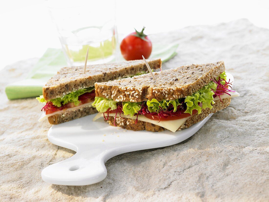 Cheese, lettuce, tomato & beetroot sprouts in wholemeal bread