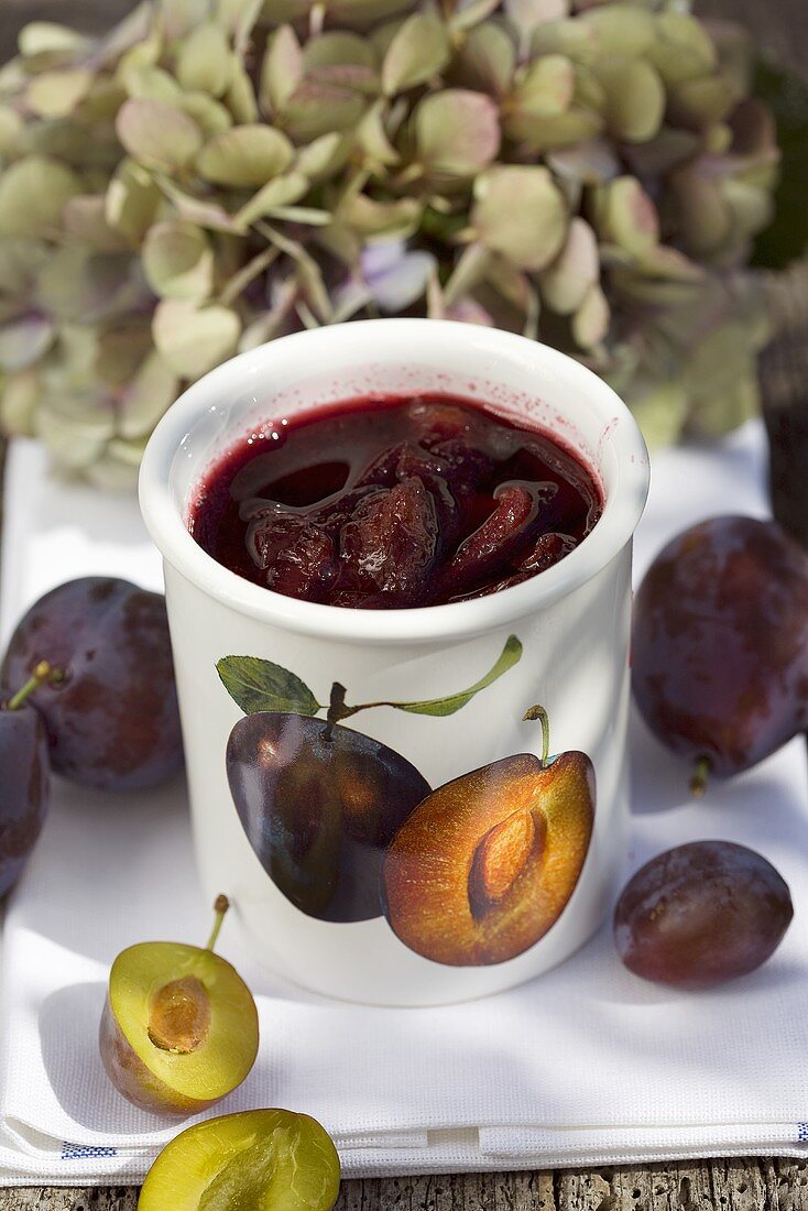 A pot of home-made plum compote