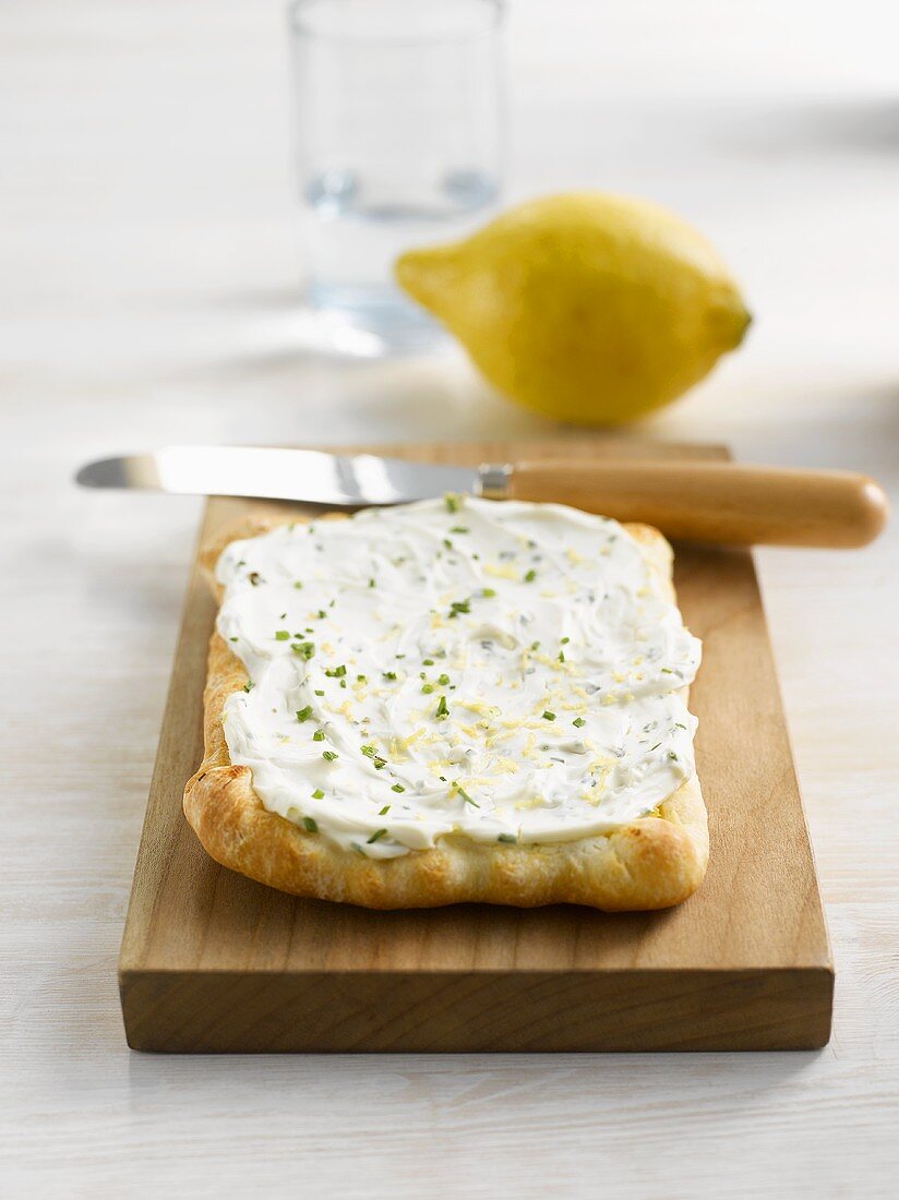 Soft cheese pizza with herbs and lemon
