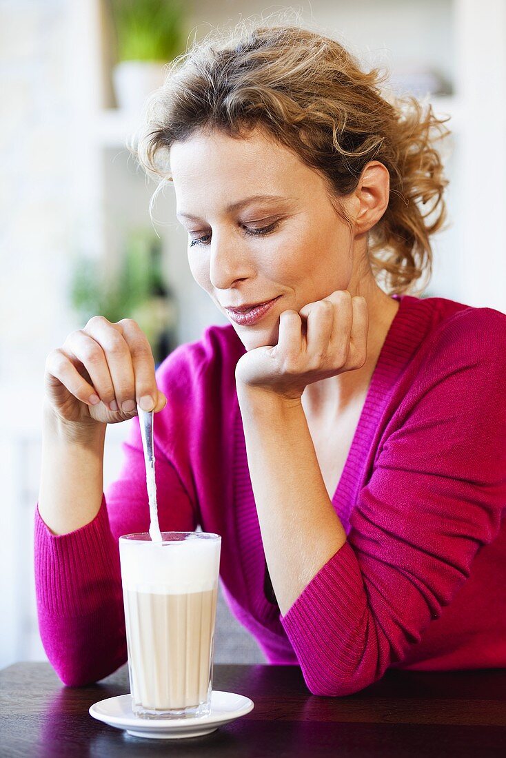 Woman drinking caffe latte