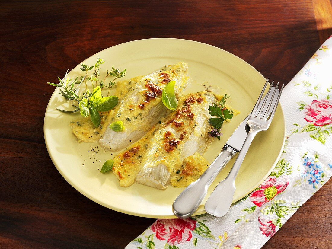 Baked chicory with cheese and herbs
