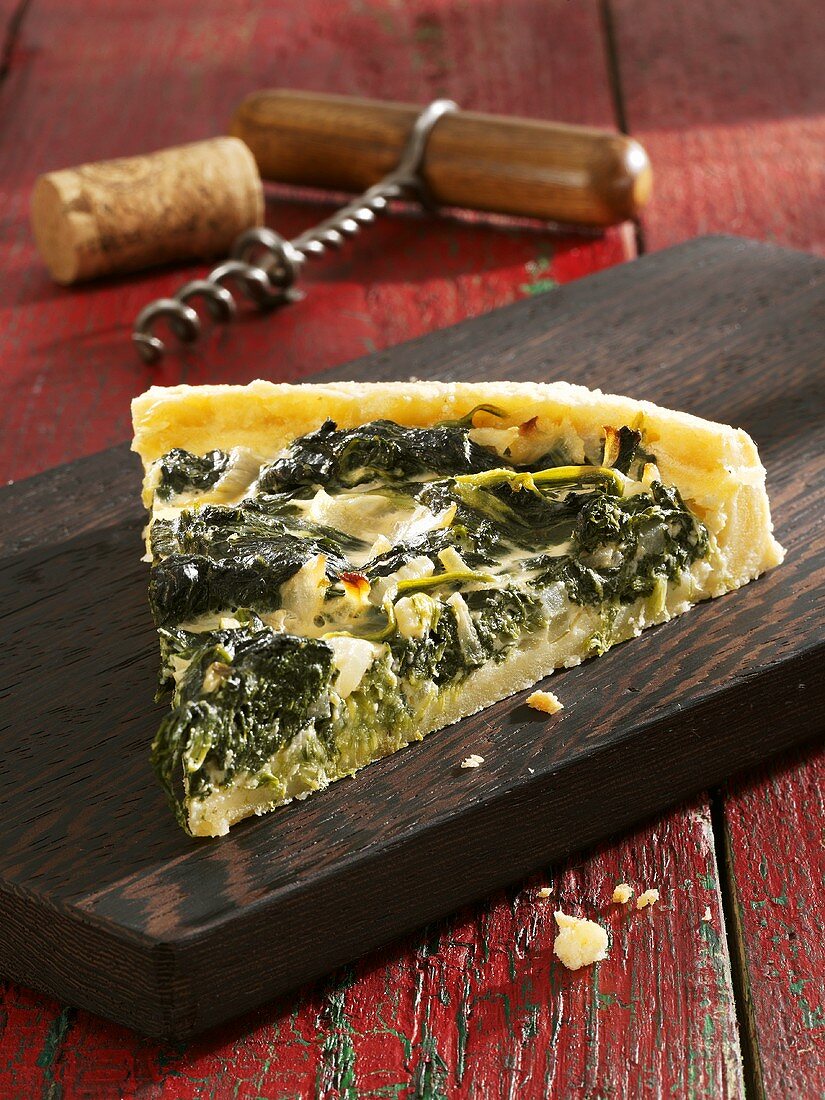 A piece of spinach quiche