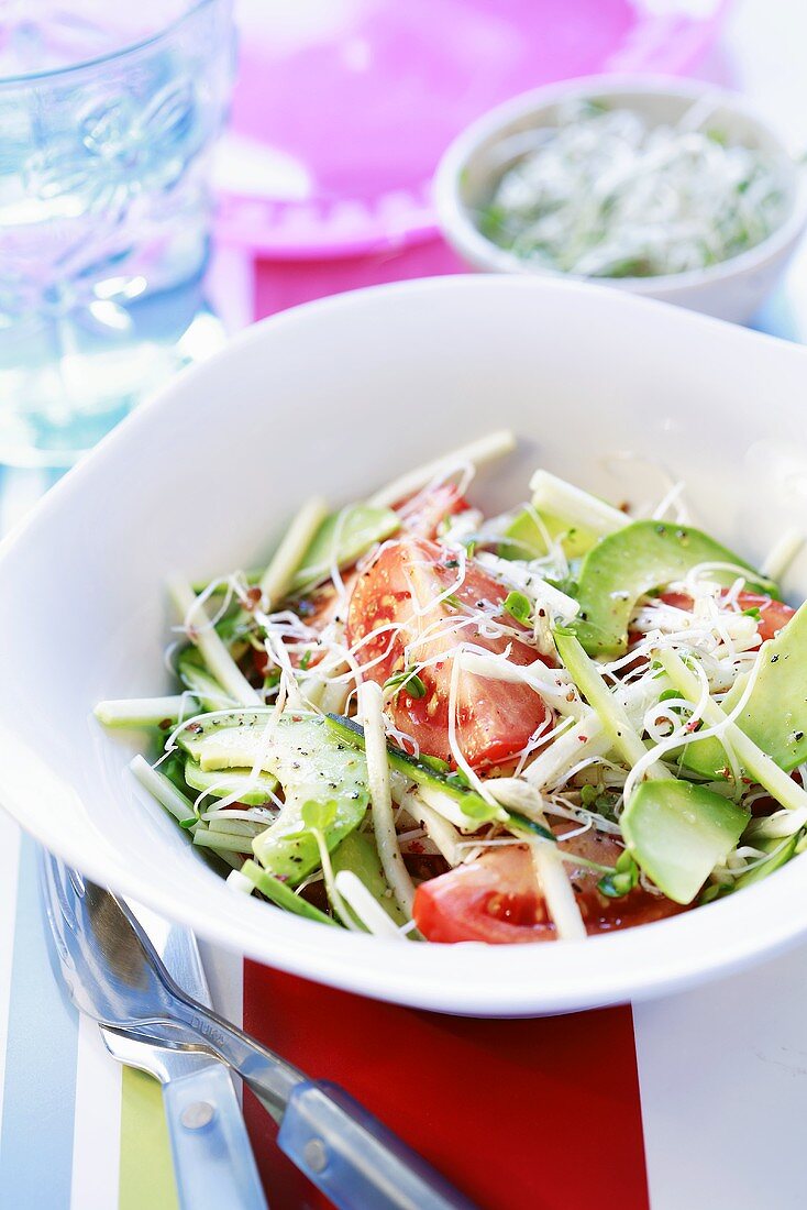 Avocado and tomato salad with bean sprouts