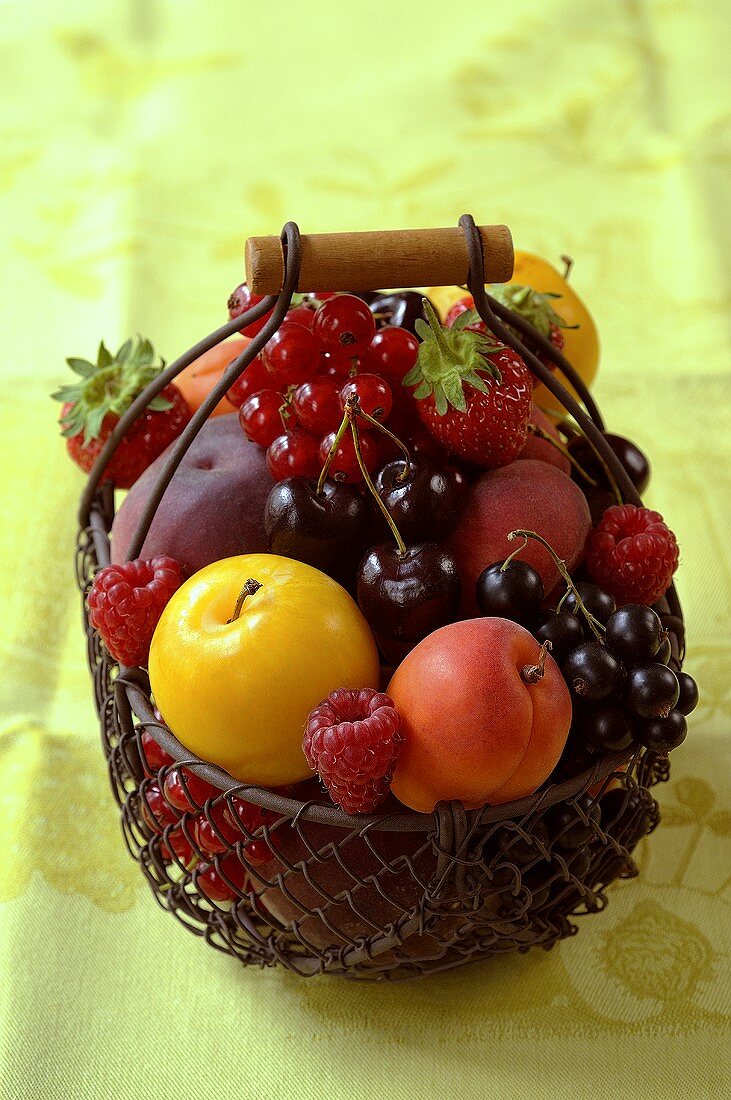 Assorted fruit in a wire basket