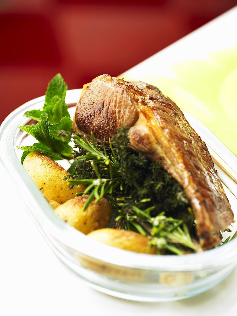 Rack of lamb on herbs with roasted potatoes