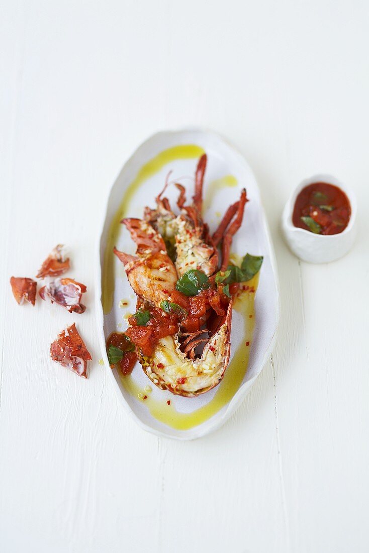 Grilled lobster with tomato and basil sauce