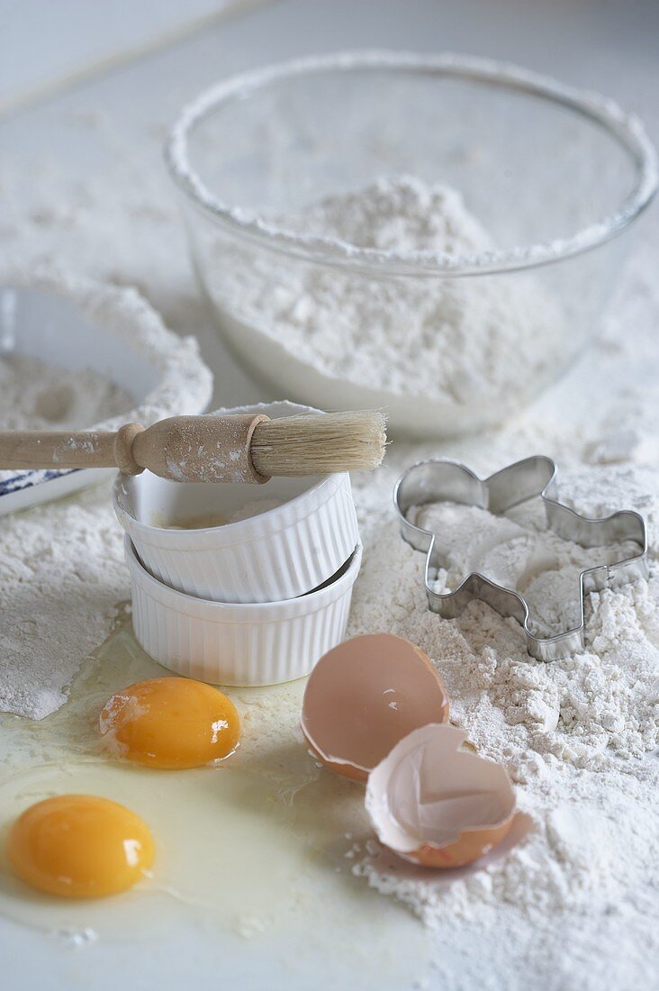 Still life with flour, eggs and ramekins