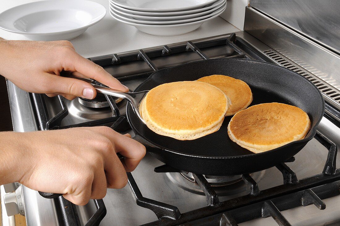 Frying pancakes in a frying pan